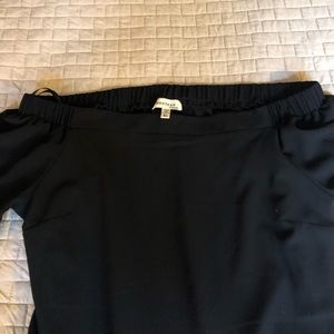 Peekaboo shoulders black blouse.